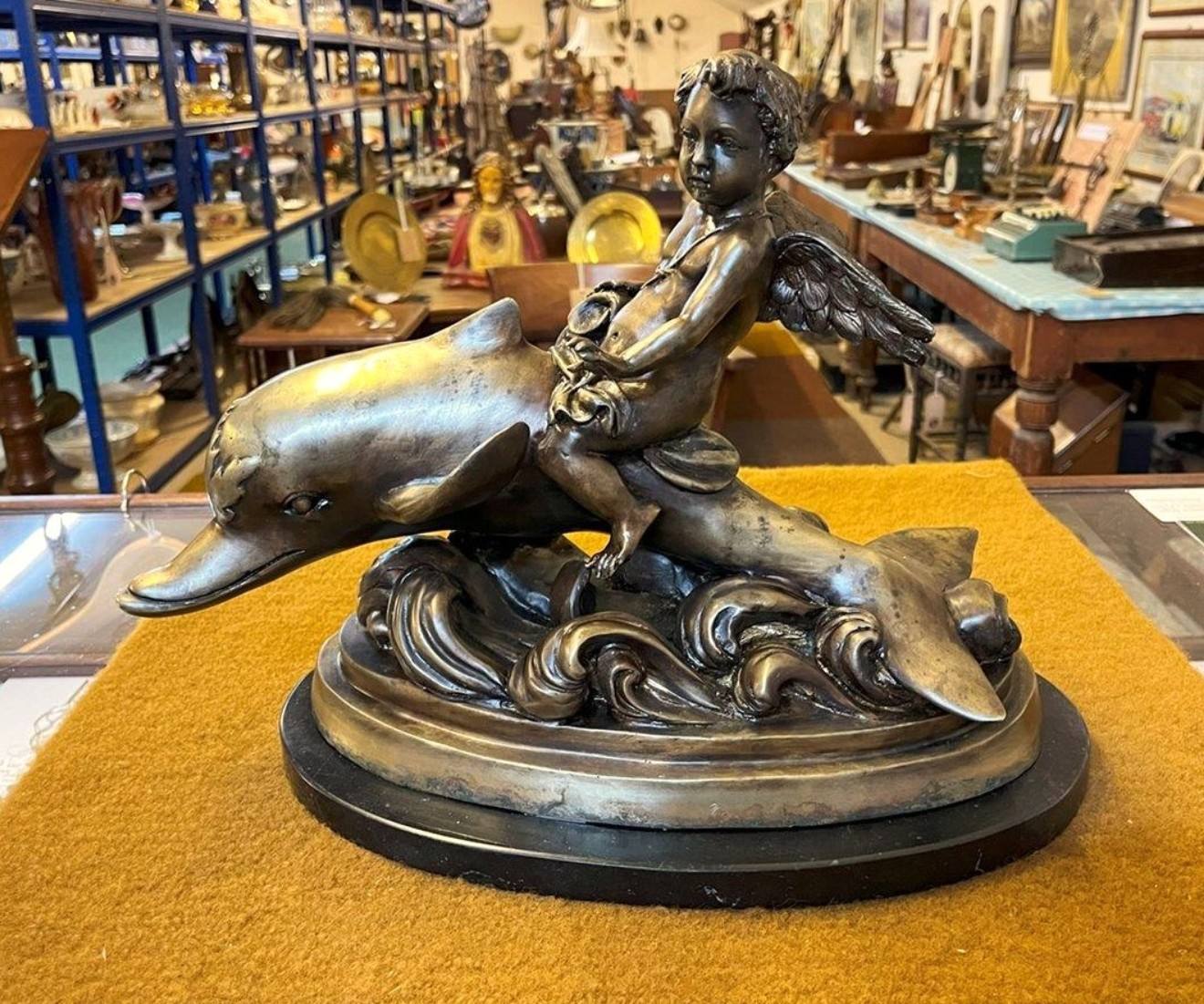 Antique Brass Bronzed Statuette of Eros Riding a Dolphin on a Marble Base