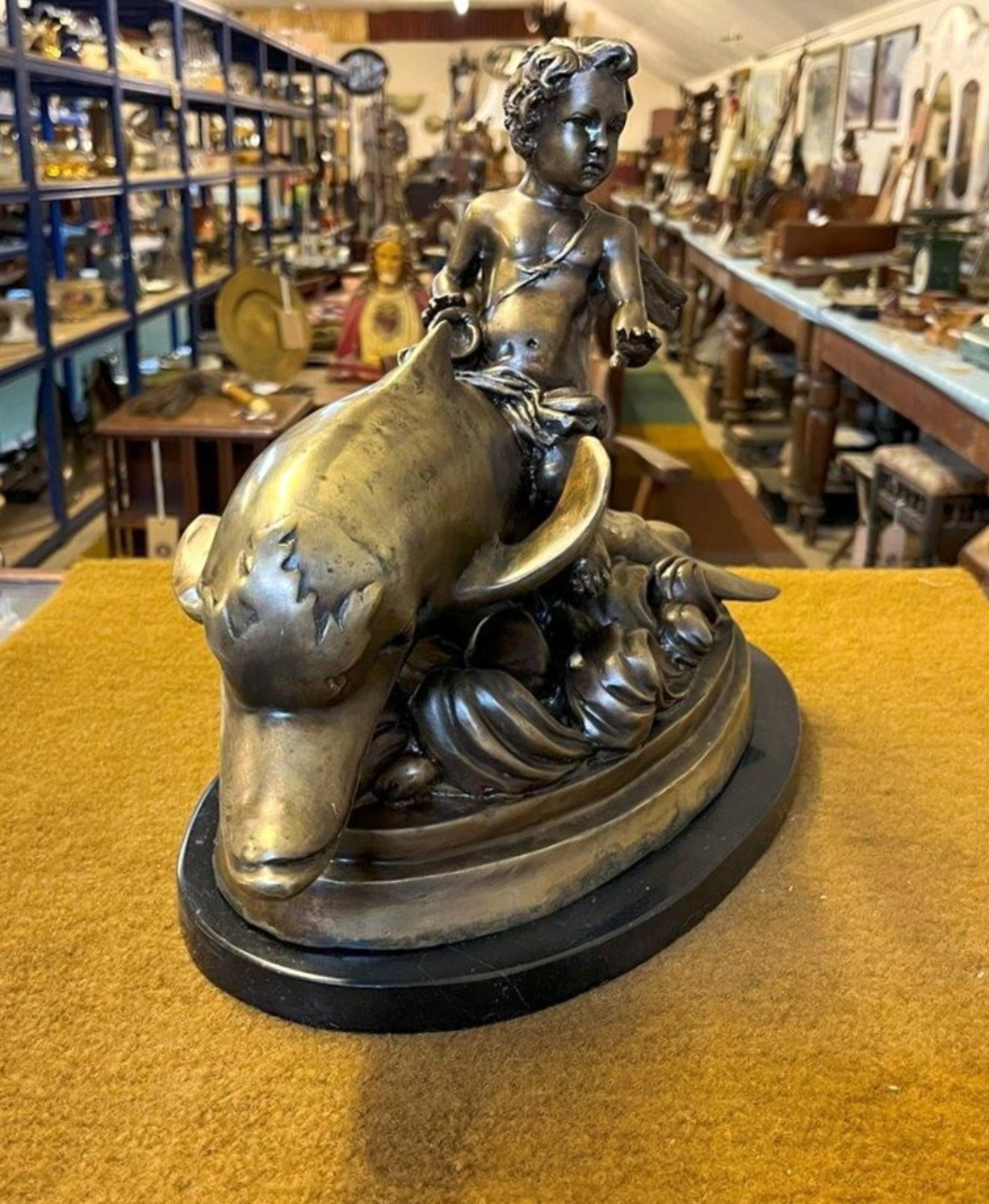 Antique Brass Bronzed Statuette of Eros Riding a Dolphin on a Marble Base