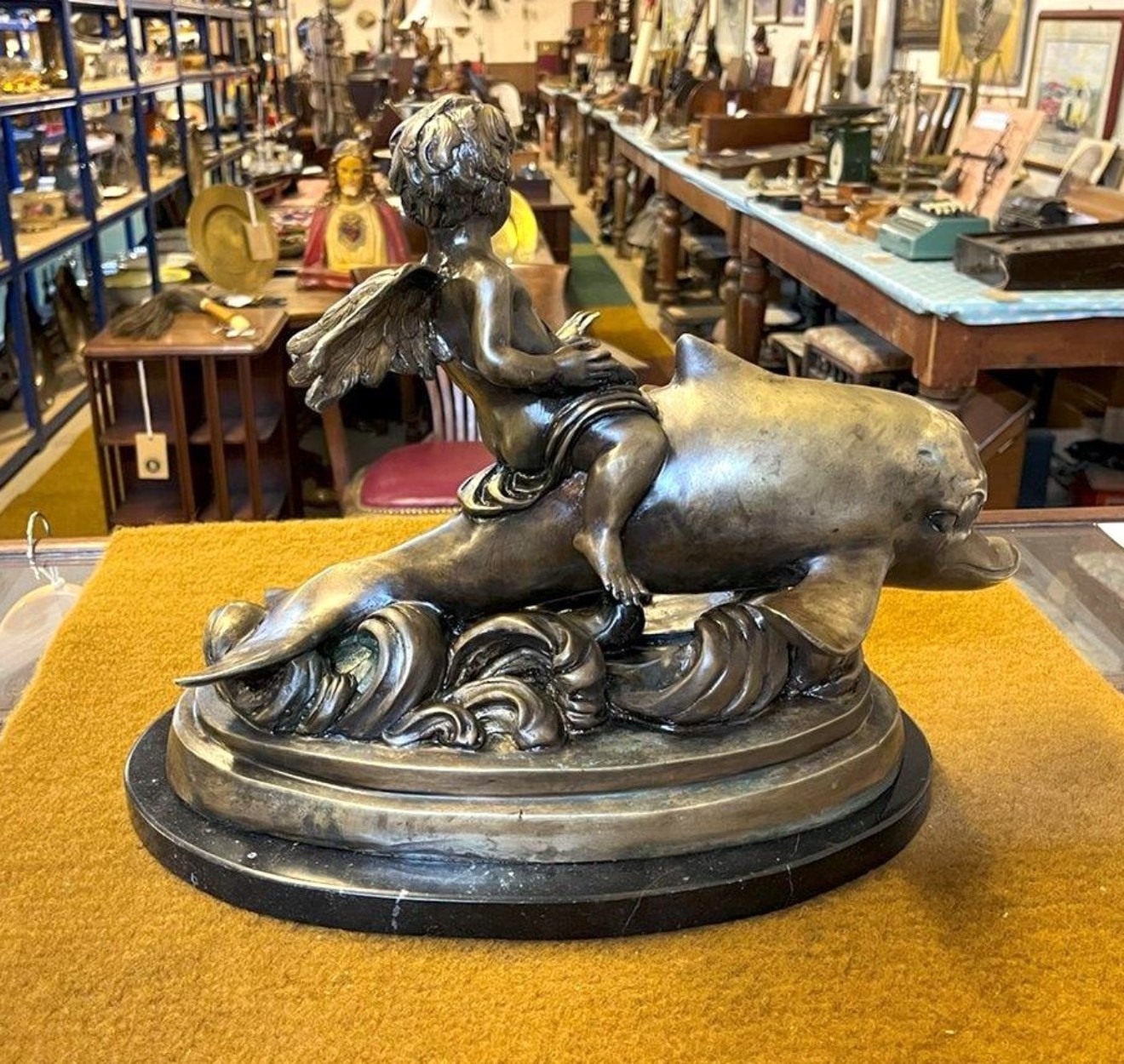 Antique Brass Bronzed Statuette of Eros Riding a Dolphin on a Marble Base