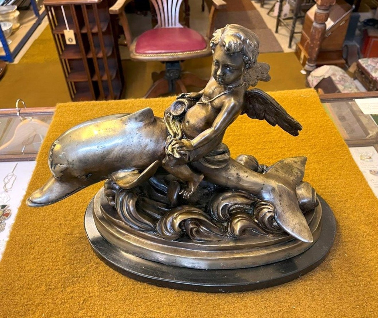 Antique Brass Bronzed Statuette of Eros Riding a Dolphin on a Marble Base