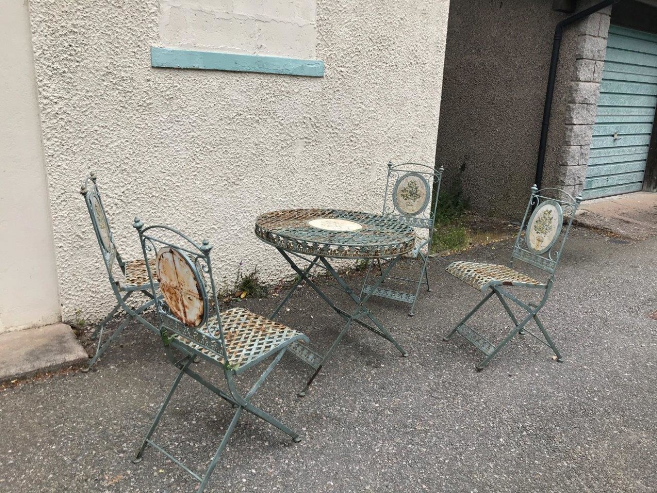 Vintage Metal Bistro Table and Chairs with Floral Relief Panel Decoration