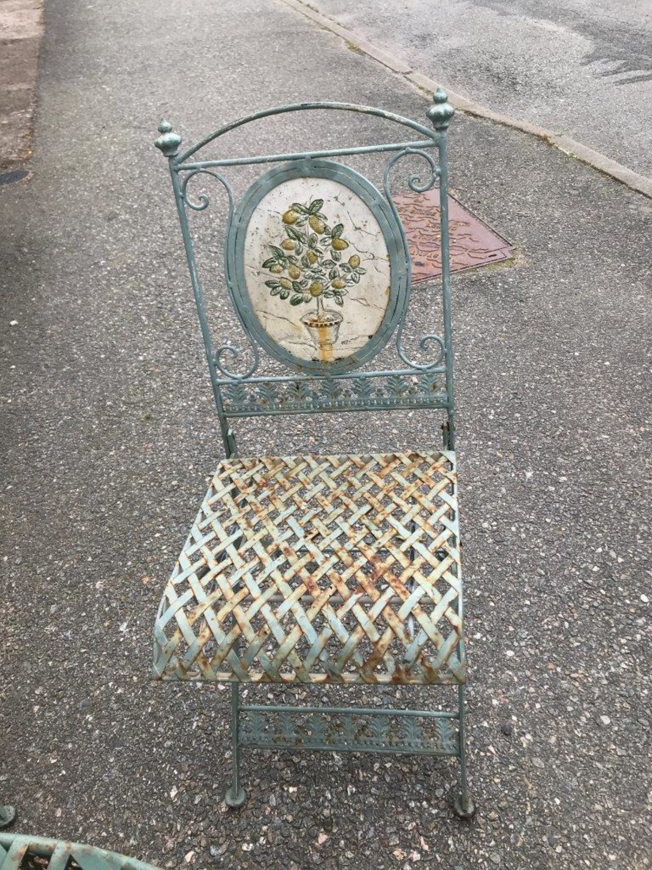 Vintage Metal Bistro Table and Chairs with Floral Relief Panel Decoration