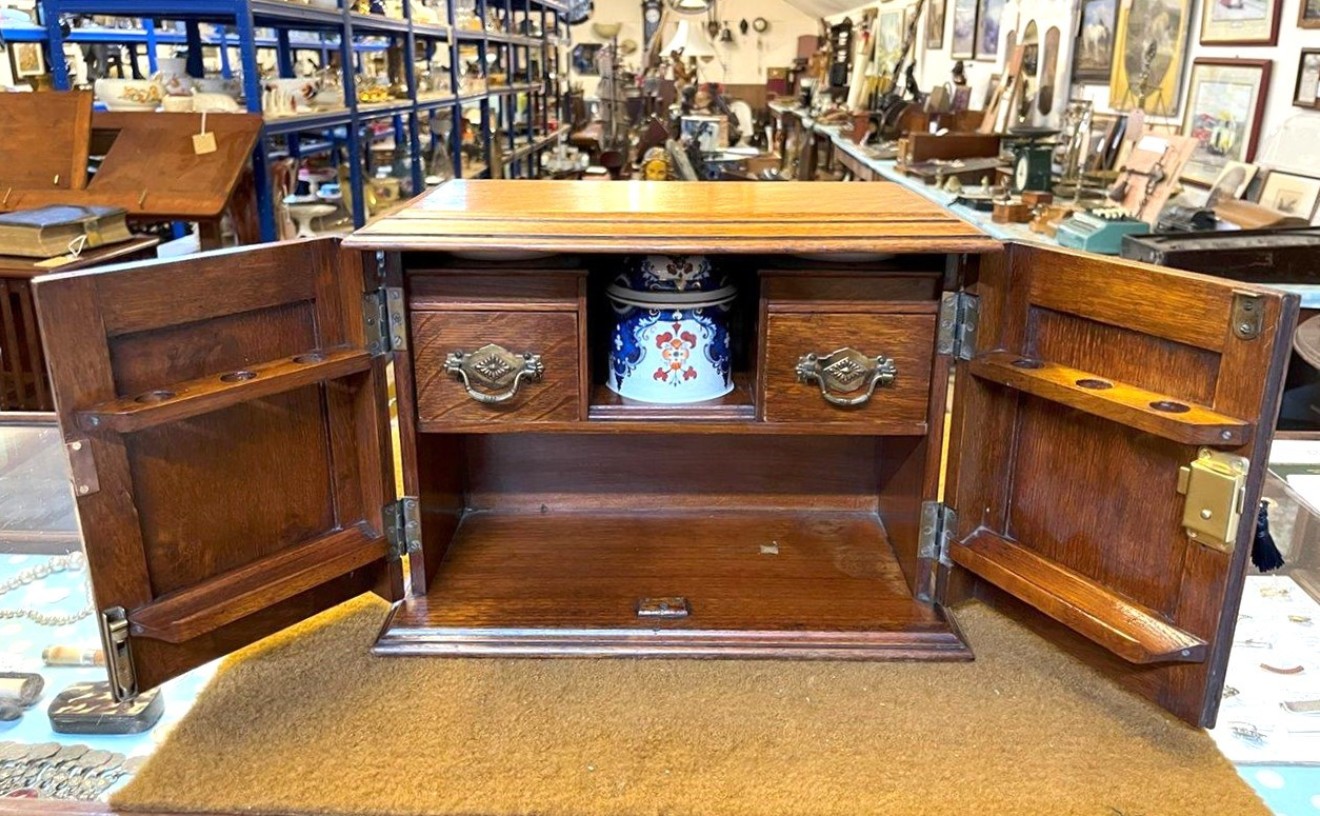 Edwardian Oak Smoker's Cabinet with Ornate Carved Door Panels and Original Ceramic Tobacco Jar and Dishes b