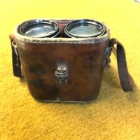 WW1 Military Binoculars Manufactured by Dollond London in a Leather Case Retailed by J Cripps London 1916, the Case is also Marked J Cubitt (presumably the owner)