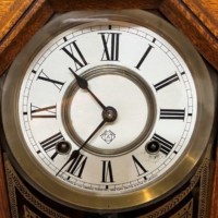 Antique American Gingerbread Clock by The Ansonia Clock Company New York