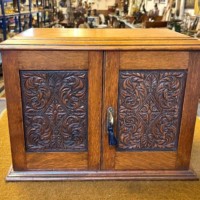 Edwardian Oak Smoker's Cabinet with Ornate Carved Door Panels and Original Ceramic Tobacco Jar and Dishes b