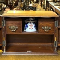 Edwardian Oak Smoker's Cabinet with Ornate Carved Door Panels and Original Ceramic Tobacco Jar and Dishes