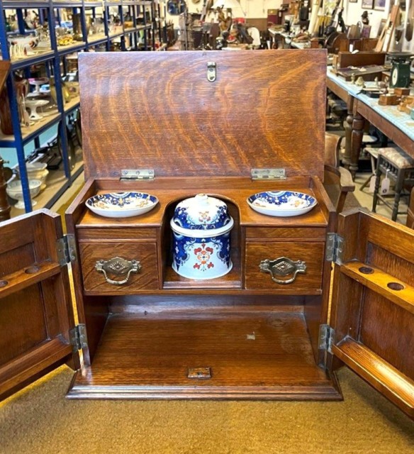 Edwardian Oak Smoker's Cabinet with Ornate Carved Door Panels and Original Ceramic Tobacco Jar and Dishes b